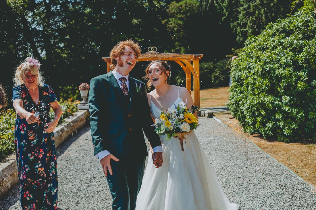 Exchanging vows, Wigfair Hall wedding photography, North Wales