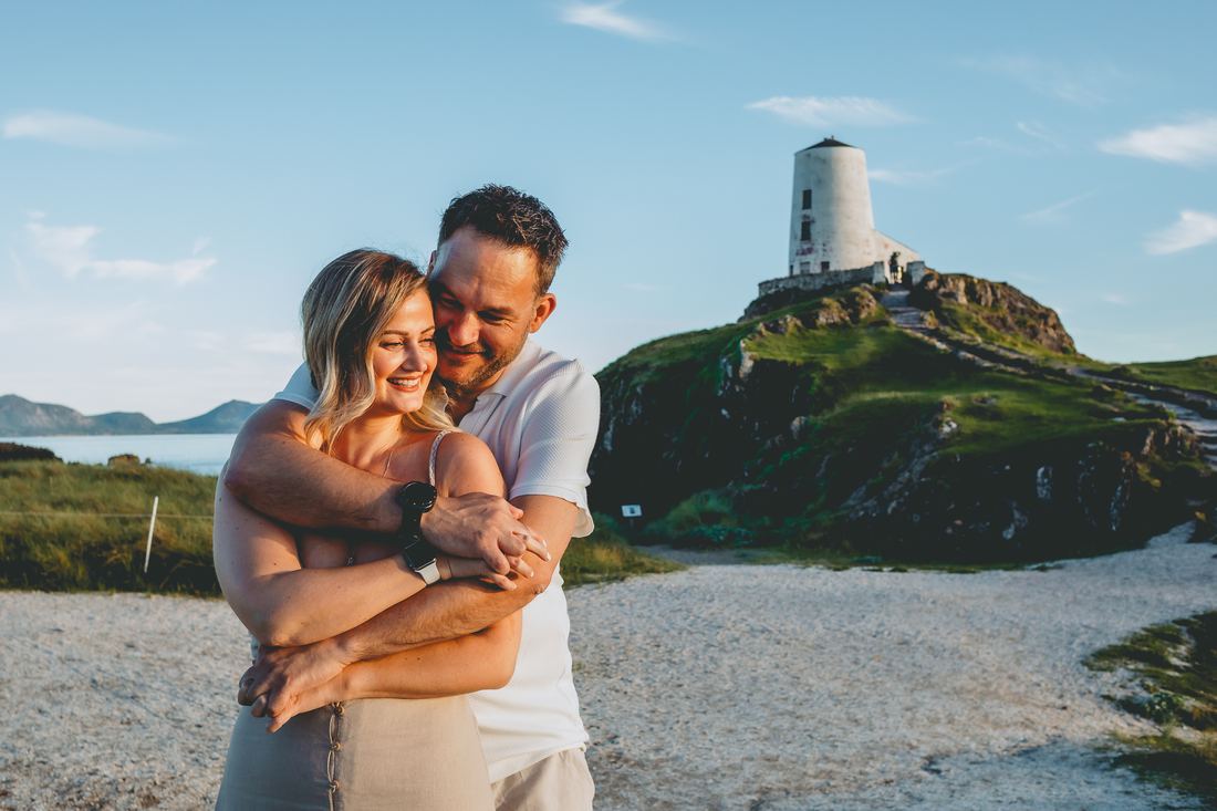 Couple walking the coastal path, Llanddwyn Island, Anglesey