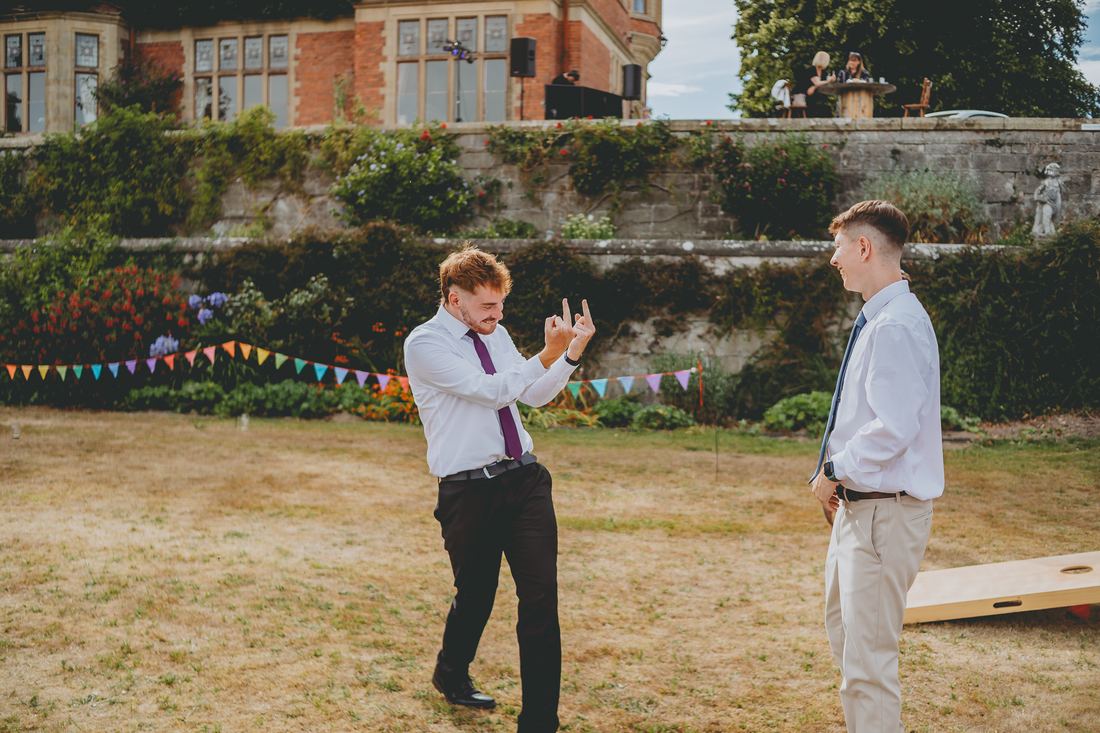 Garden games at the reception, Wigfair Hall wedding photography, North Wales