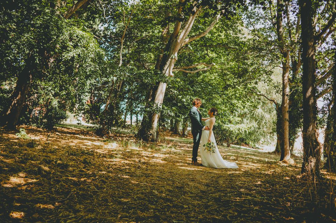 Newlywed portraits with the wedding car, Wigfair Hall wedding photography, North Wales