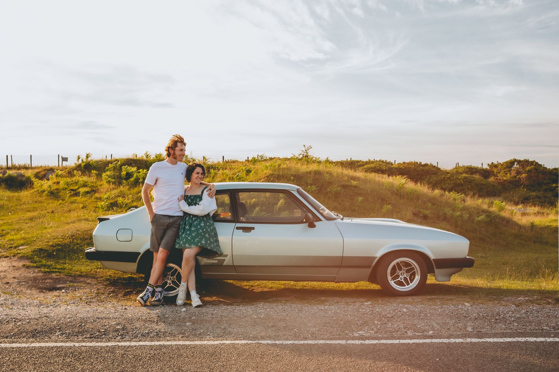 North Wales outdoor engagement photography, sunset with classic car, Halkyn Mountain