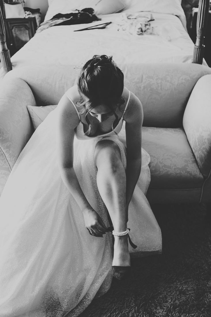 Exchanging vows, Wigfair Hall wedding photography, North Wales